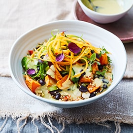 Couscous salade met geroosterde zoete aardappel en zwarte boontjes